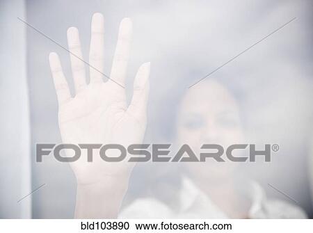 Cape Verdean woman putting hand on window View Large Photo Image Stock Image - Cape Verdean woman putting hand on window. Fotosearch