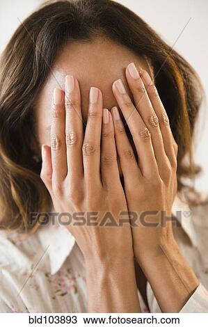 Cape Verdean woman with hands over face View Large Photo Image Stock Image - Cape Verdean woman with hands over face. Fotosearch