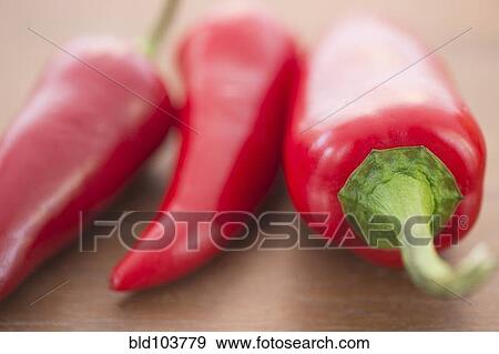Close up of red chili peppers View Large Photo Image Stock Photo - Close up of red chili peppers. Fotosearch