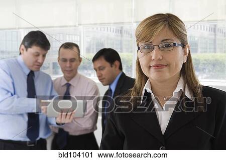 Hispanic business people working together View Large Photo Image Stock Image - Hispanic business people working together. Fotosearch