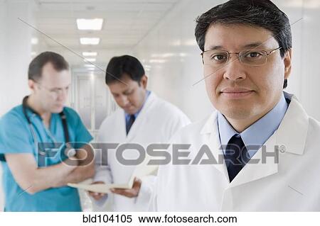 Hispanic doctors in hospital View Large Photo Image Stock Photography - Hispanic doctors in hospital. Fotosearch