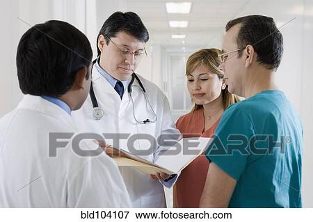 Hispanic medical professionals in hospital View Large Photo Image Stock Photo - Hispanic medical professionals in hospital. Fotosearch
