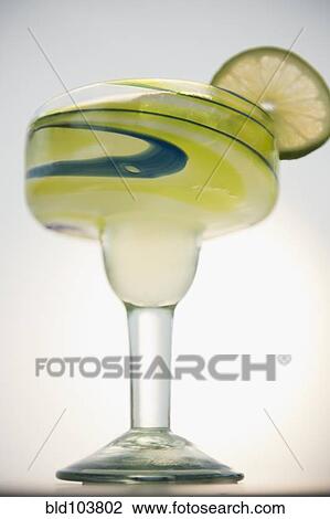 Lime slice on rim of margarita View Large Photo Image Stock Image - Lime slice on rim of margarita. Fotosearch