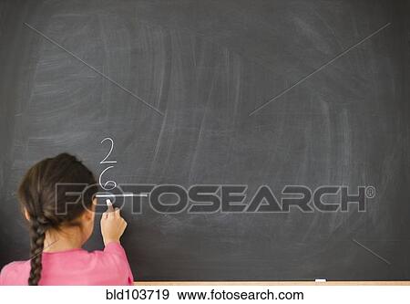 Mixed race girl doing math on blackboard View Large Photo Image Stock Photo - Mixed race girl doing math on blackboard. Fotosearch