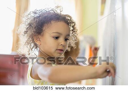 Mixed race girl drawing View Large Photo Image Stock Photography - Mixed race girl drawing. Fotosearch