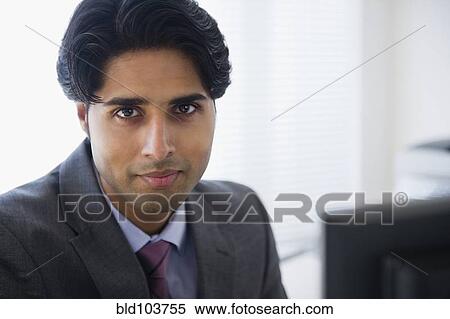 Serious mixed race businessman View Large Photo Image Stock Photography - Serious mixed race businessman. Fotosearch