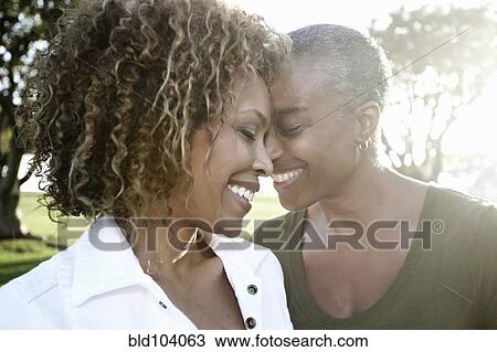 Smiling African American mother and daughter View Large Photo Image Stock Image - Smiling African American mother and daughter. Fotosearch