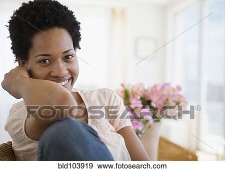 Stock Photo - Smiling African American woman. Fotosearch