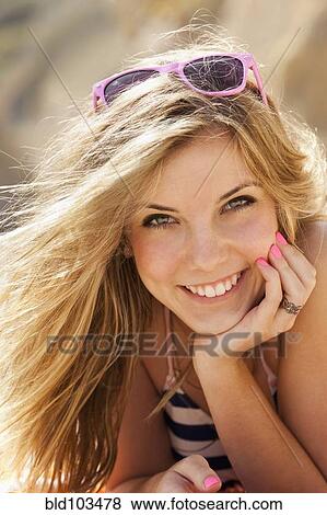 Stock Photo - Smiling Caucasian teenager. Fotosearch
