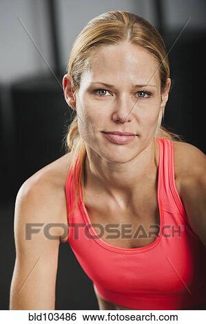 Stock Photograph - Smiling Caucasian woman. Fotosearch
