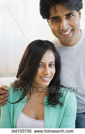 Stock Photography - Smiling mixed race couple. Fotosearch