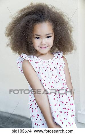 Picture - Smiling mixed race girl. Fotosearch