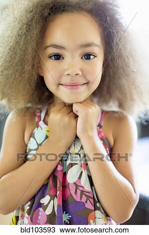 Stock Image - Smiling mixed race girl. Fotosearch