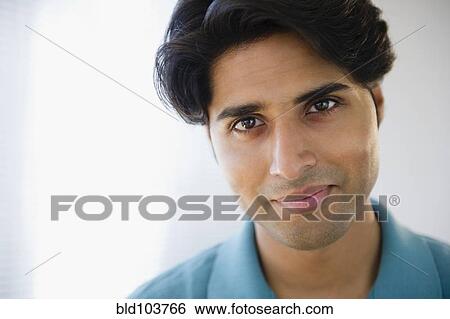 Stock Photograph - Smiling mixed race man. Fotosearch