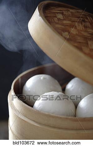 Stock Image - Steamed red bean buns. Fotosearch