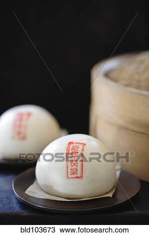 Stock Image - Steamed red bean buns. Fotosearch