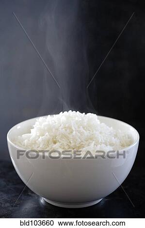 Steaming bowl of cooked rice View Large Photo Image Stock Image - Steaming bowl of cooked rice. Fotosearch