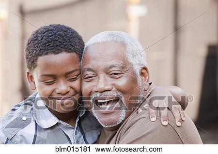 African American grandfather hugging grandson View Large Photo Image Stock Image - African American grandfather hugging grandson. Fotosearch