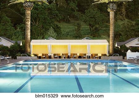 Stock Photo - Cabana near swimming pool. Fotosearch