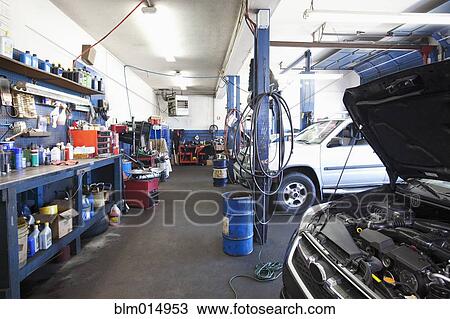 Stock Image - Cars in auto repair shop. Fotosearch