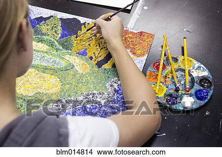 Picture - Caucasian artist painting. Fotosearch