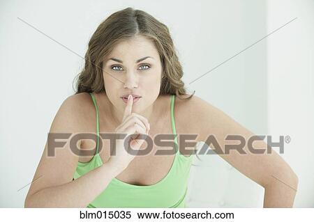 Caucasian making shhh gesture View Large Photo Image Stock Photography - Caucasian making shhh gesture. Fotosearch