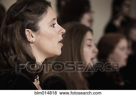 Stock Photo - Caucasian students singing in choir. Fotosearch