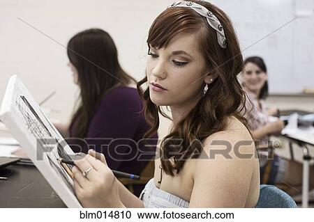 Caucasian woman in art class View Large Photo Image Stock Image - Caucasian woman in art class. Fotosearch