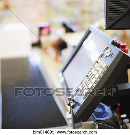 Stock Photography - Close up of grocery store register. Fotosearch