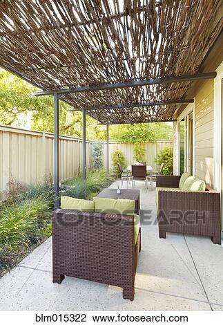 Elegant furniture on covered patio View Large Photo Image Stock Image - Elegant furniture on covered patio. Fotosearch
