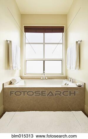 Stock Image - Elegant tub in bathroom. Fotosearch