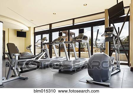Exercise equipment in hotel gym View Large Photo Image Stock Image - Exercise equipment in hotel gym. Fotosearch