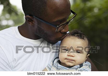 Father kissing baby View Large Photo Image Stock Image - Father kissing baby. Fotosearch