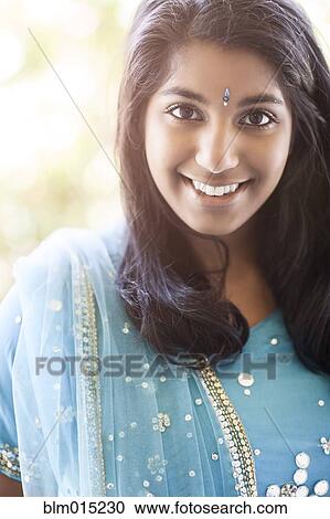 Indian woman in traditional clothing View Large Photo Image Stock Image - Indian woman in traditional clothing. Fotosearch