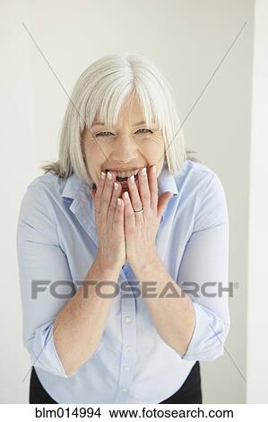 Picture - Laughing Caucasian woman. Fotosearch