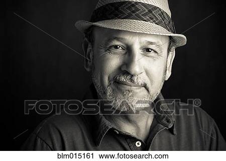 Stock Image - Middle Eastern man in hat. Fotosearch
