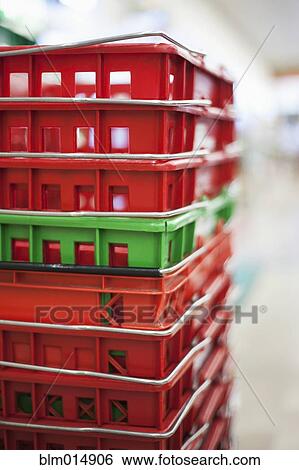 Red grocery baskets stacked up View Large Photo Image Stock Photograph - Red grocery baskets stacked up. Fotosearch