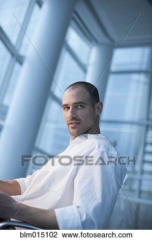 Serious Caucasian businessman View Large Photo Image Stock Image - Serious Caucasian businessman. Fotosearch