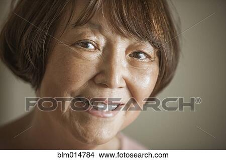 Smiling Asian woman View Large Photo Image Picture - Smiling Asian woman. Fotosearch