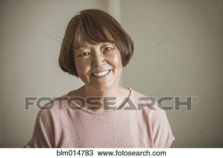 Smiling Asian woman View Large Photo Image Stock Image - Smiling Asian woman. Fotosearch