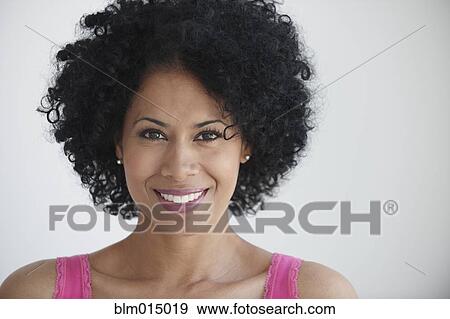 Stock Photo - Smiling Black woman. Fotosearch