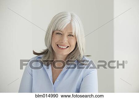 Stock Image - Smiling Caucasian woman. Fotosearch