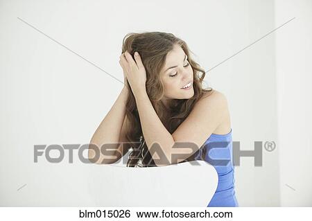 Stock Photograph - Smiling Caucasian woman. Fotosearch