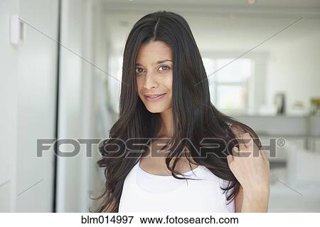 Stock Photo - Smiling Hispanic woman. Fotosearch