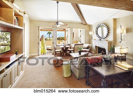 Picture - Woman standing in elegant living room. Fotosearch