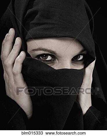Stock Image - Woman wearing burka. Fotosearch