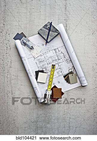 Stock Image - Blueprints, color swatches and measuring tape. Fotosearch