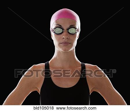 Caucasian swimmer in swim cap and goggles View Large Photo Image Stock Photo - Caucasian swimmer in swim cap and goggles. Fotosearch