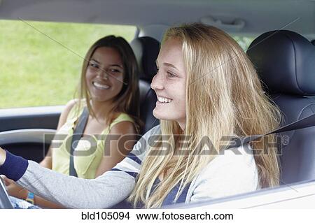 Picture - Caucasian teenagers in car. Fotosearch