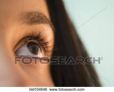 Close up of Hispanic teenager's eye View Large Photo Image Stock Photograph - Close up of Hispanic teenager's eye. Fotosearch